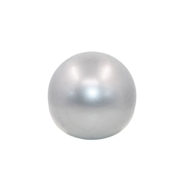 Small pink Pilates ball made of non-slip PVC, perfect for yoga, balance exercises, and gym workouts